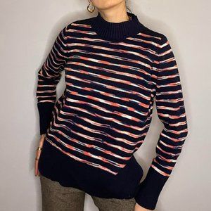 Navy blue, pink, and white striped knit sweater